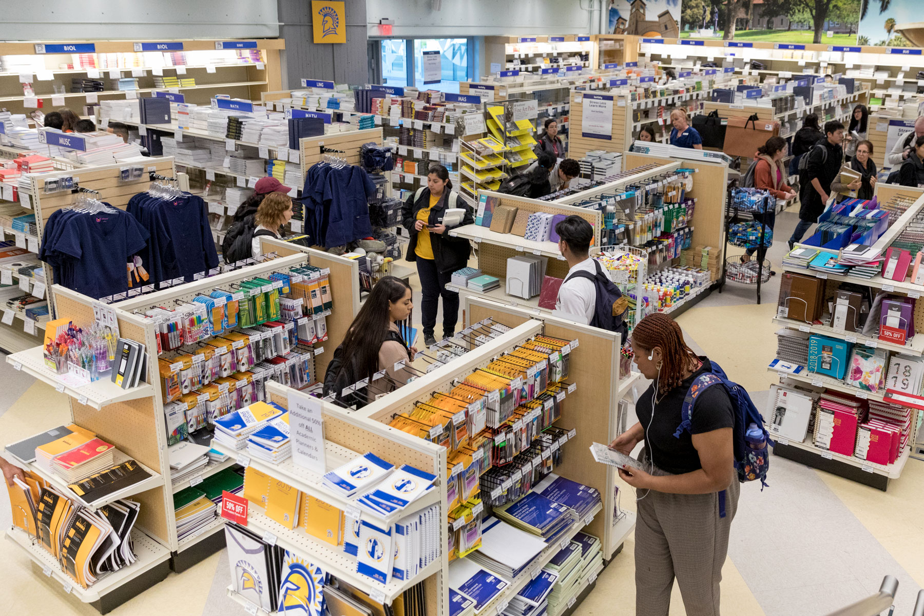 Students roaming around the bookstore.