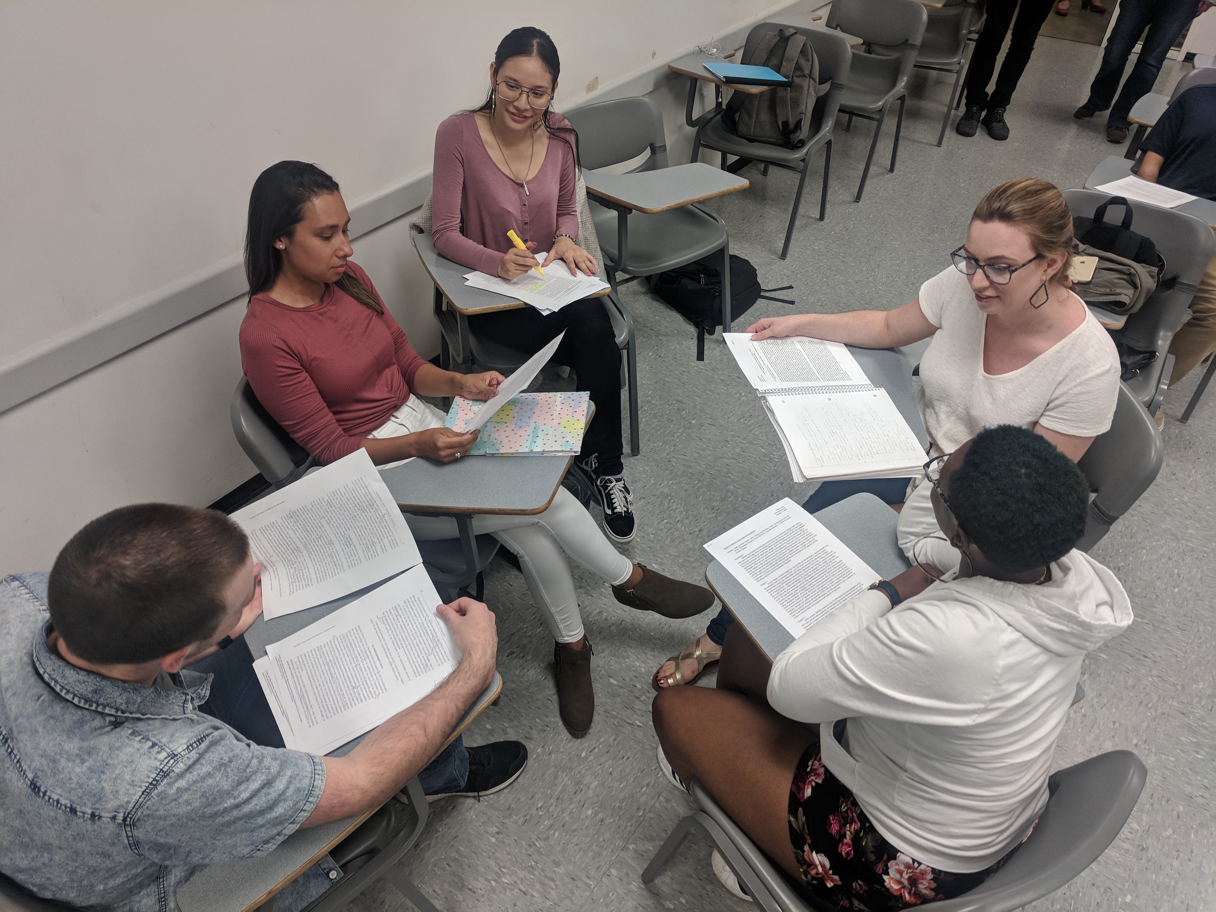 Students talking with each other in a classroom