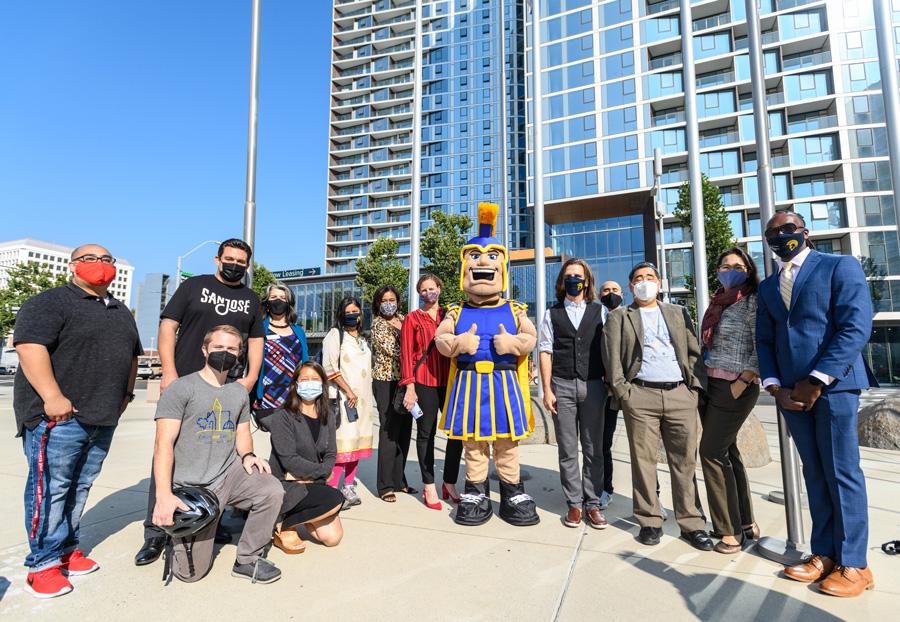 Sammy Spartan posing with SJSU and San Jose community members.