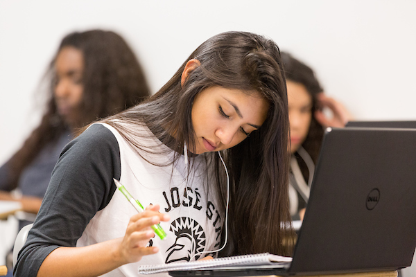 student working on a laptop