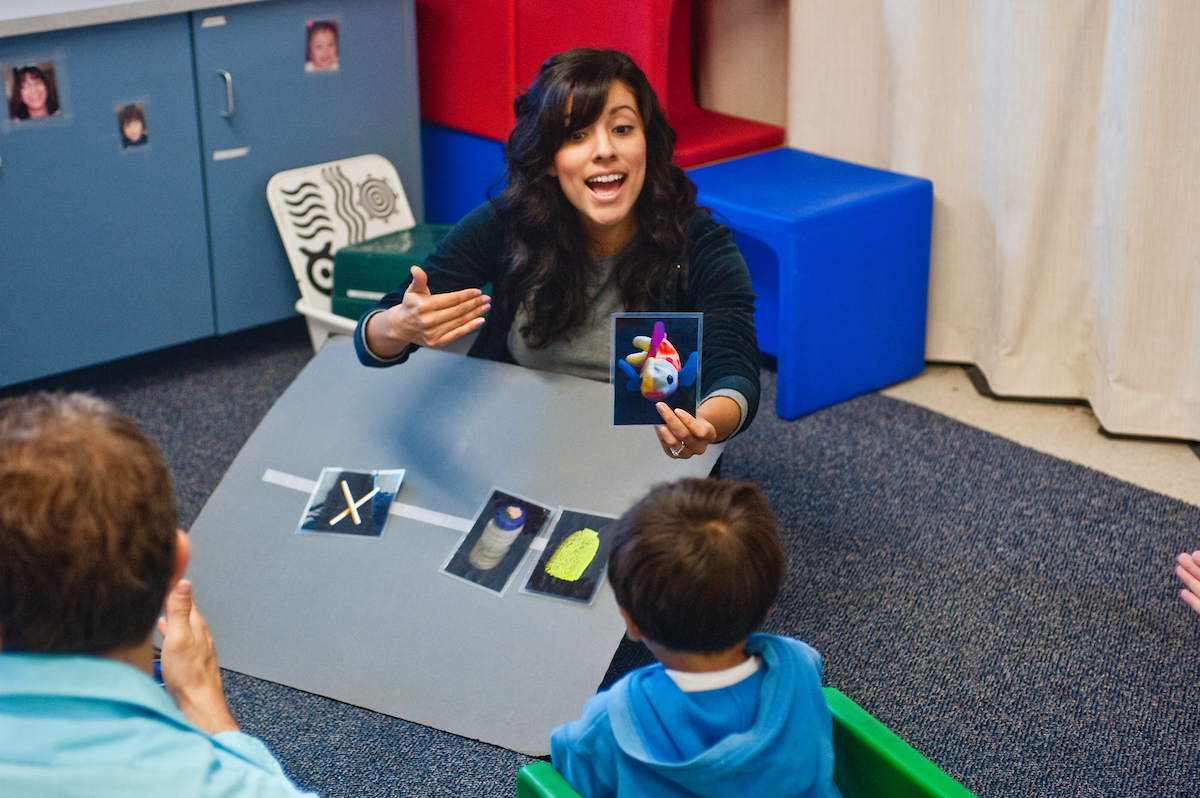 children in classroom with teacher