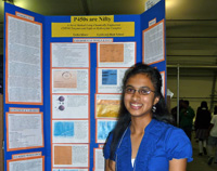 Eesha Kare in front of her project