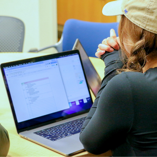 student working on a laptop