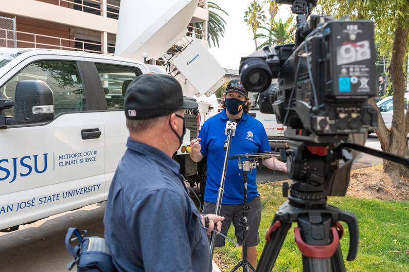 a member of press films an interview with faculty expert