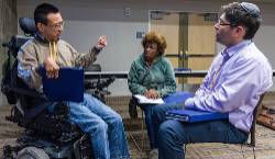 Three IGD Participants engaged in dialogue.