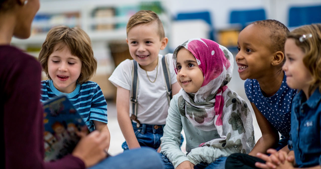 Teacher Leads a DIscussion with Young Children