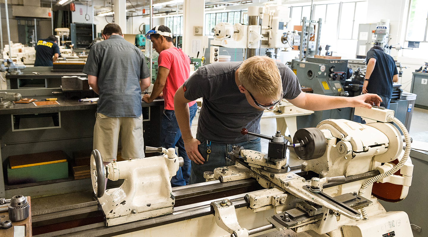 Student working at machine