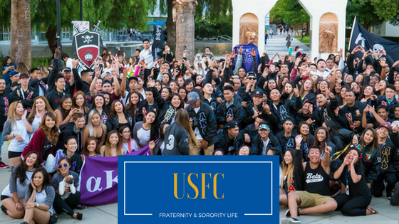 Group of students with USFC banner