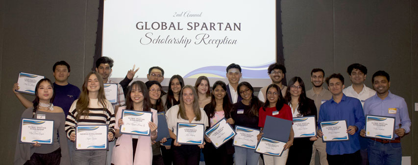 Global Scholarship Awardees holding certificates