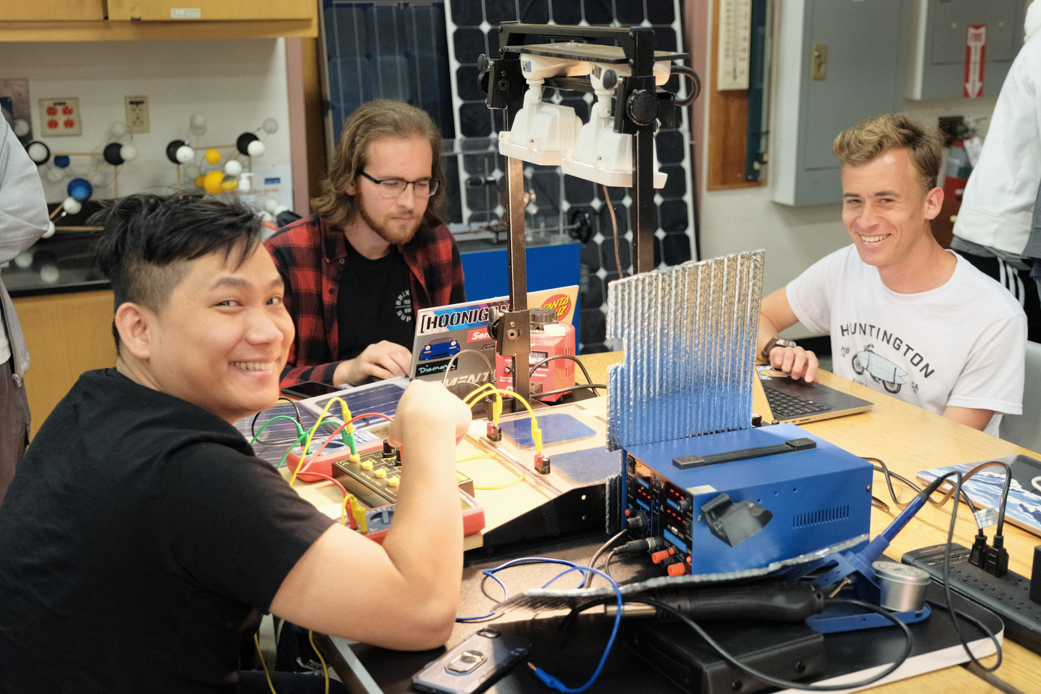 students working on a solar power lab station