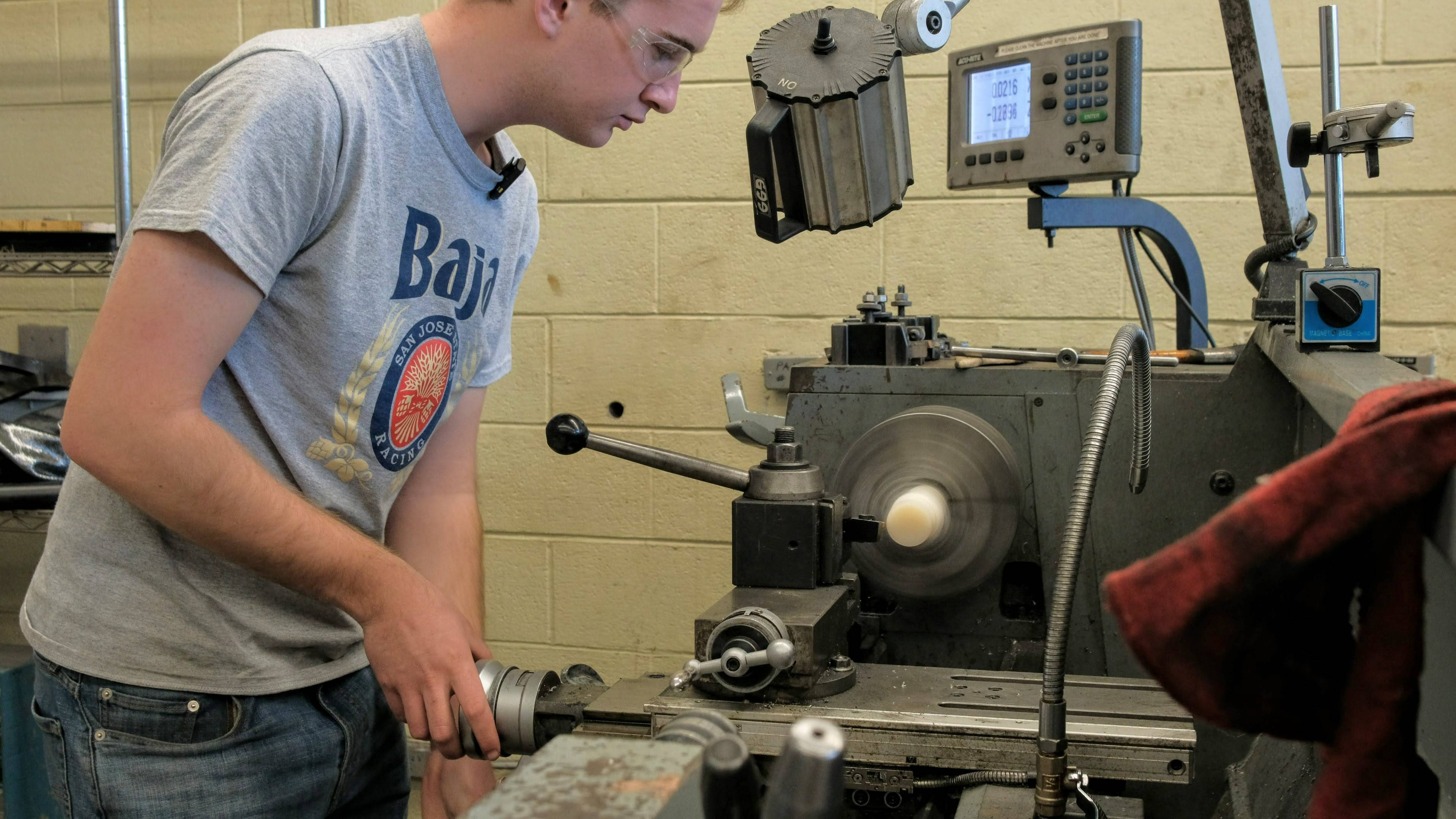 Student working on a lathe