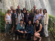 vietnam group photo  in front of waterfalls 