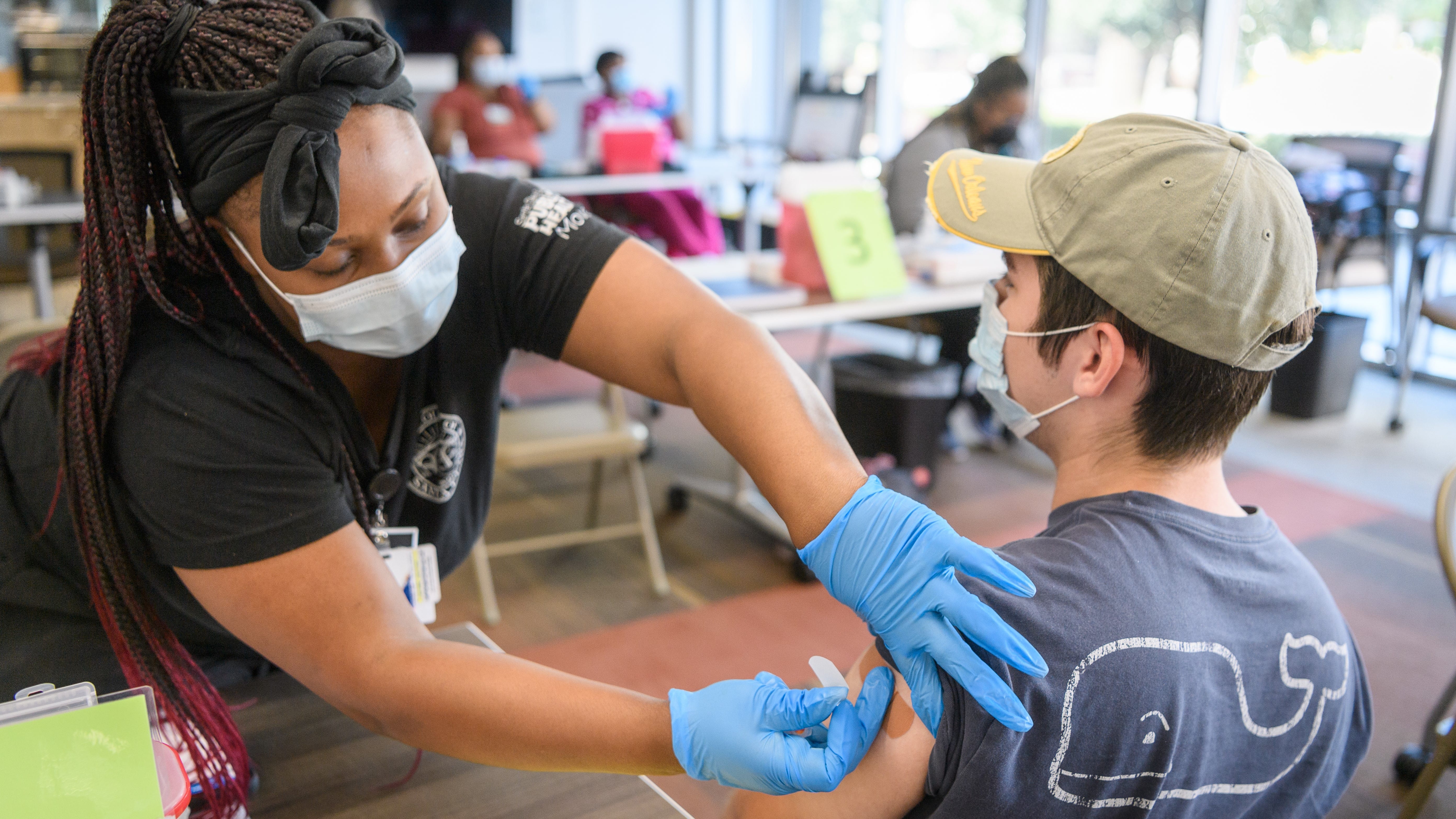 Working at a vaccination clinic