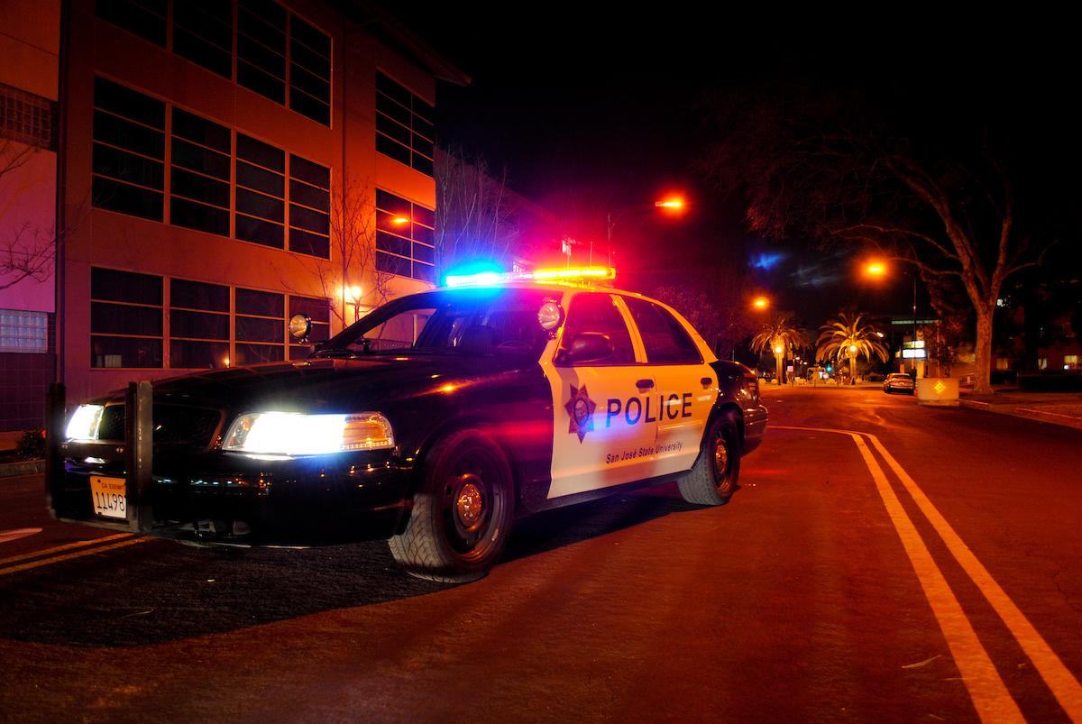 University police car with flashing lights