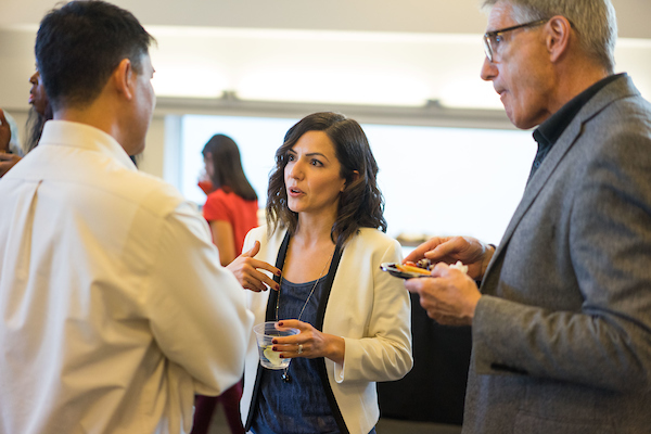 Lily Gangai talking with others at the new centers opening