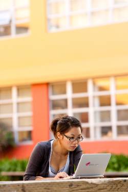 woman outside studying