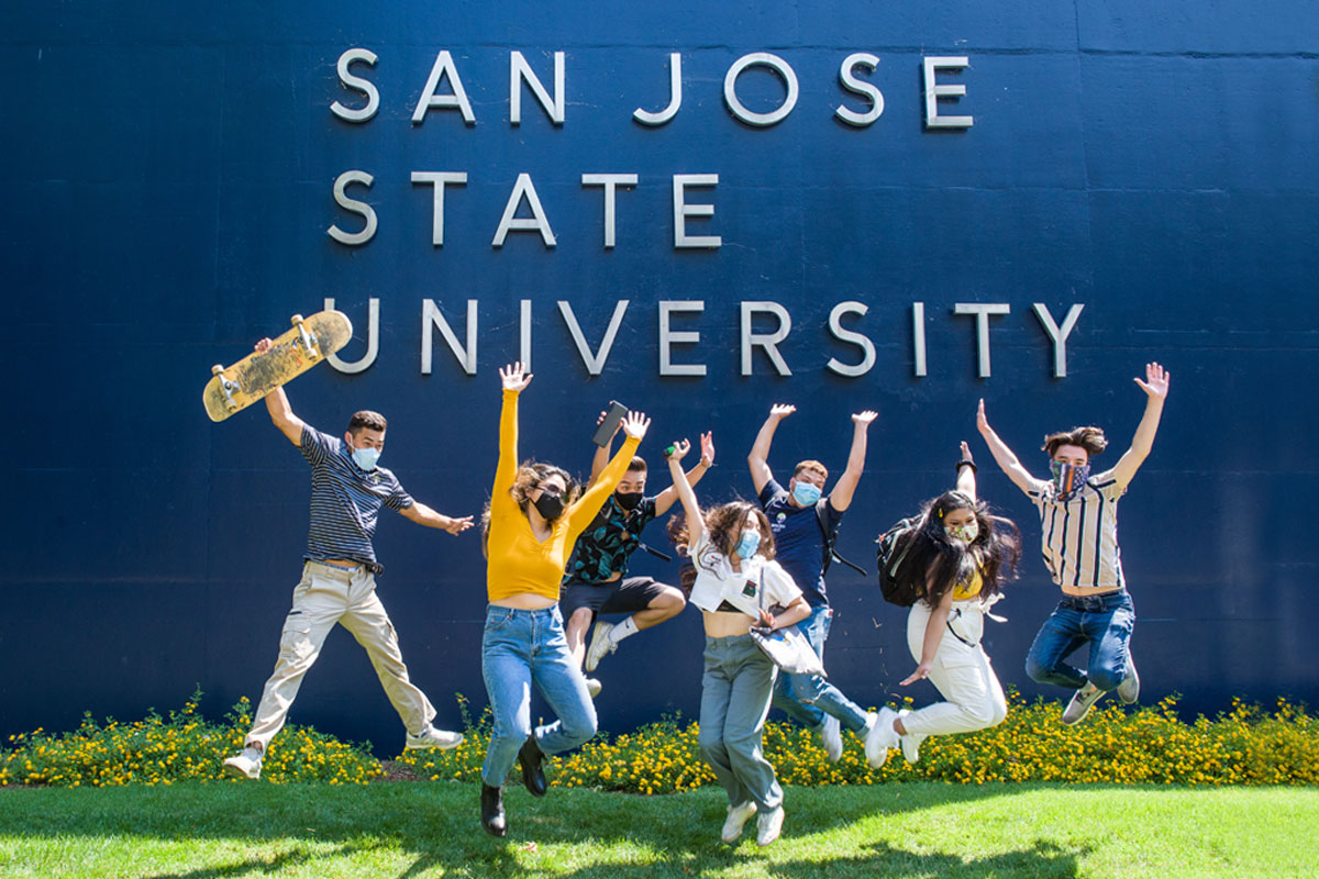 Students jumping in the air.