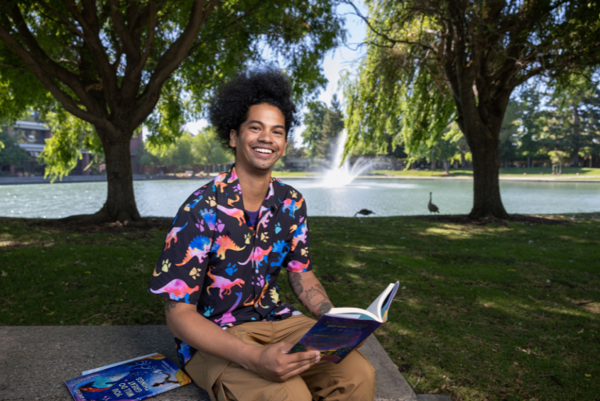 Mychal Threets, '18 MLIS, is the new host of Reading Rainbow.