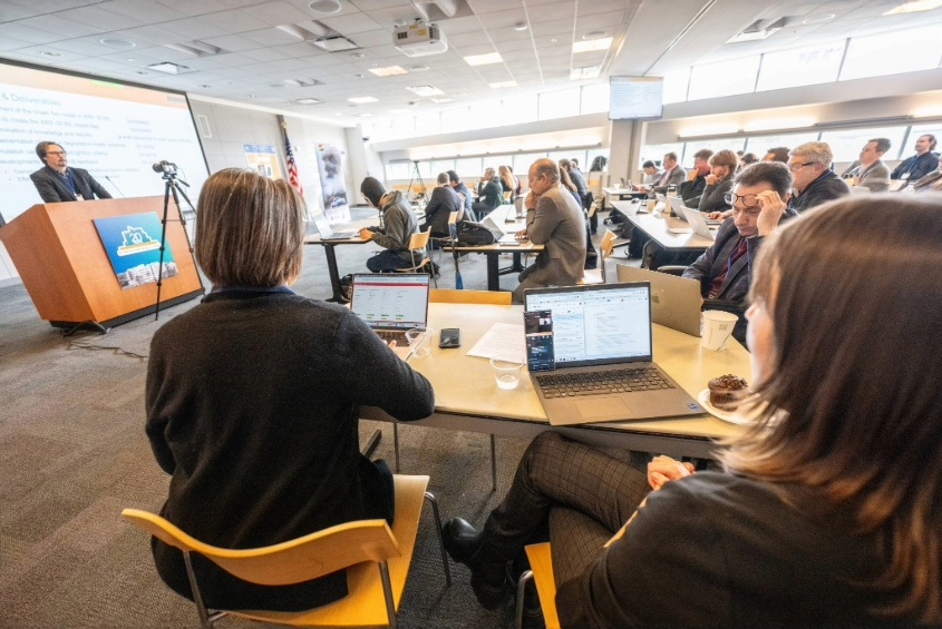A meeting of Finance and Business services staff attending a seminar workshop.