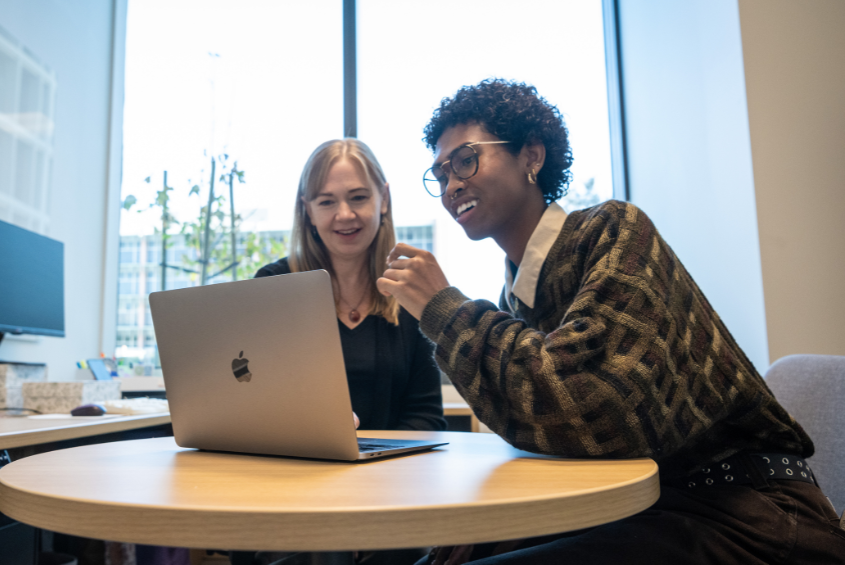 College of Science associate dean Miri Van Hoeven meets with a student.