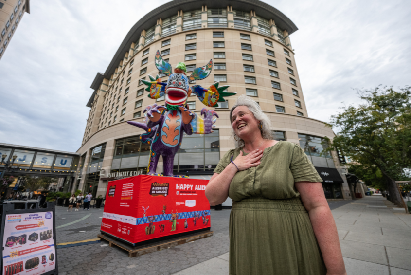 Mary Elizabeth Anderson, the associate dean for research and faculty success in SJSU’s College of Humanities and the Arts, at the exhibition of alebrijes in Plaza de César Chávez Park.