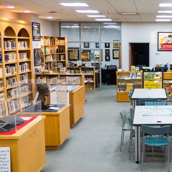 Interior of the Steinbeck Center with bookshelves and desks.