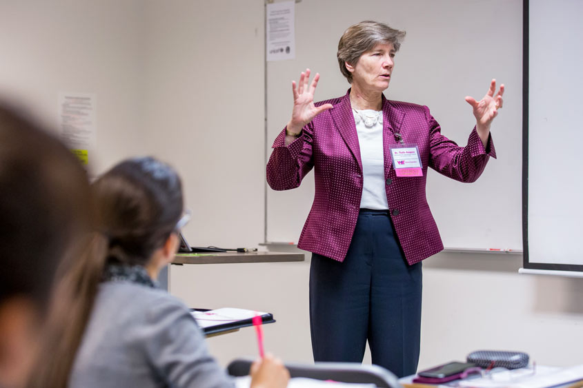 Thalia Anagnos speaking in a classroom.