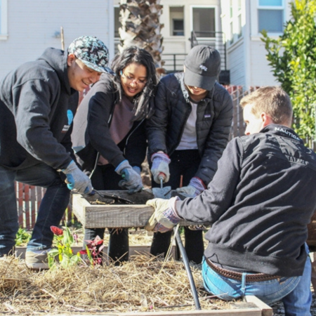 students at the campus community garden